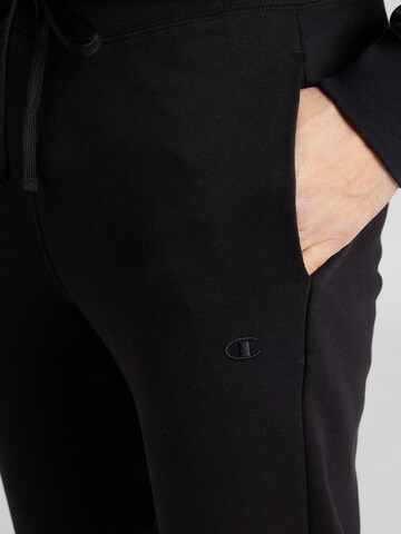 Champion Authentic Athletic Apparel Zwężany krój Spodnie 'Legacy' w kolorze czarny