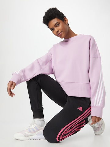 ADIDAS SPORTSWEAR Tapered Urheiluhousut 'Essentials Fleece 3-Stripes' värissä musta