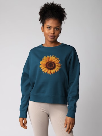 Felpa 'Sonnenblume ' di Watapparel in verde: frontale