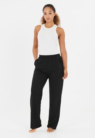 Athlecia Regular Workout Pants in Black