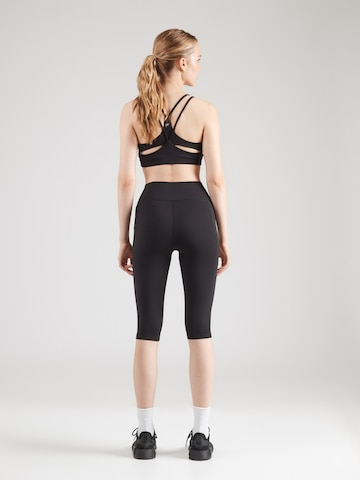 UNDER ARMOUR - Skinny Pantalón deportivo 'Motion' en negro