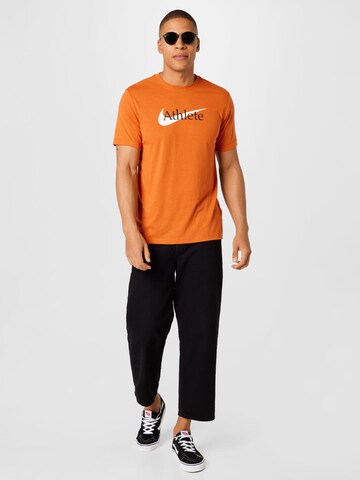 NIKE Средняя посадка Функциональная футболка 'Athlete' в Оранжевый