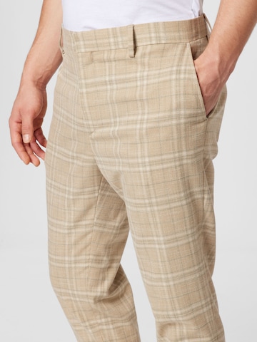 Tapered Pantaloni eleganți de la BURTON MENSWEAR LONDON pe bej