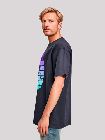 T-Shirt 'Retro Alien Weltraum Sonnenuntergang' F4NT4STIC en bleu