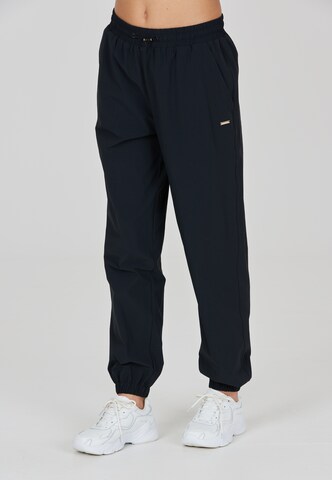 Athlecia Regular Workout Pants 'Hero' in Black: front