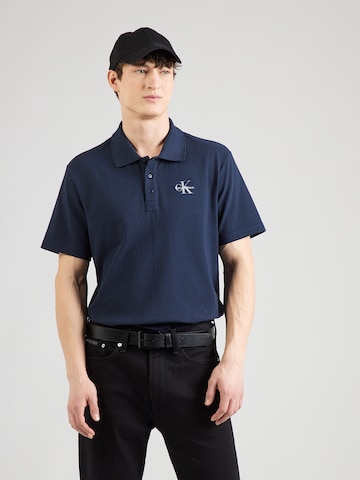 Tricou de la Calvin Klein Jeans pe albastru: față