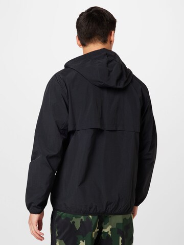 new balance Between-Season Jacket in Black