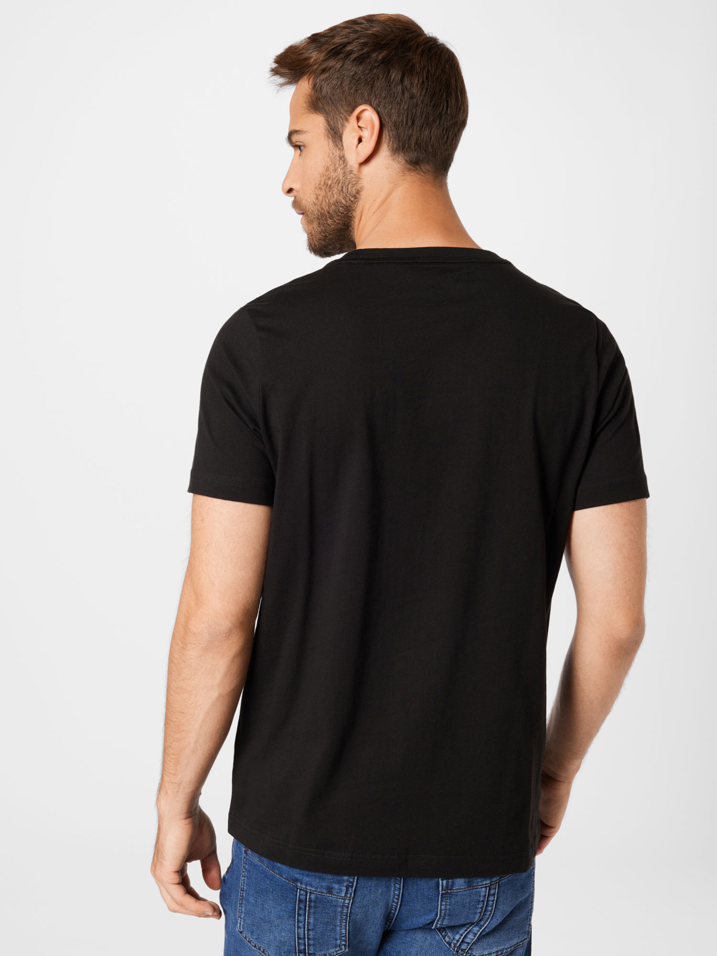 Promos T-Shirt fonctionnel PUMA en Noir 