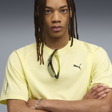 PUMA Functioneel shirt 'Pumatech' in Geel