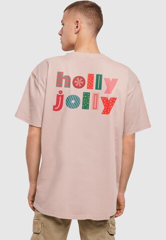 Merchcode T-Shirt 'Christmas Holly Jolly Mood' in Pink: Vorderseite