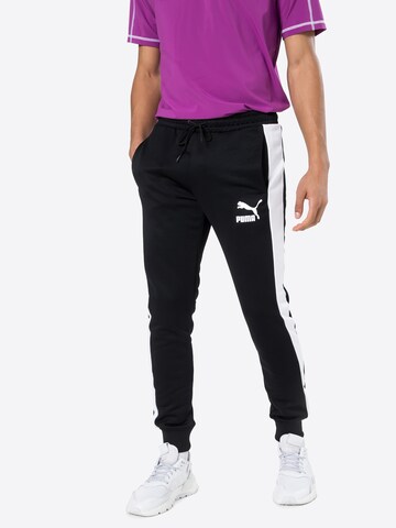 Effilé Pantalon de sport 'Iconic T7' PUMA en noir : devant