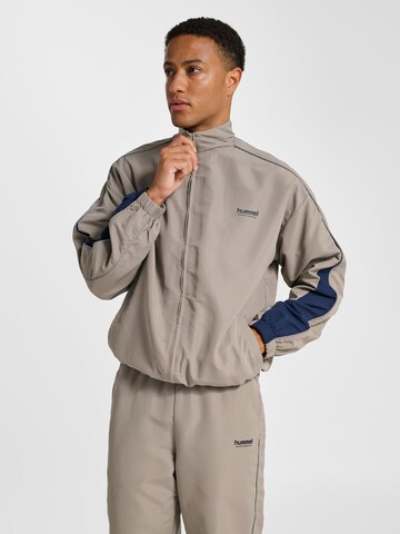 Veste de sport 'Loose Track' Hummel en gris : devant