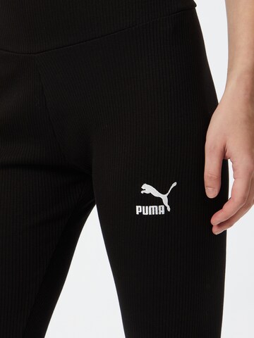 Skinny Pantaloni sportivi 'Classics' di PUMA in nero