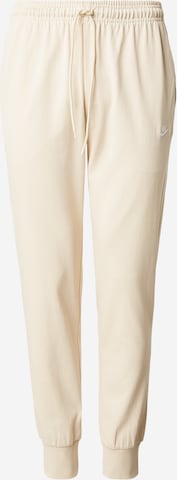 žalia Nike Sportswear Siaurėjantis Kelnės 'CLUB': priekis