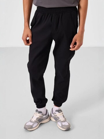 Pantaloni chino di Tommy Life in nero: frontale
