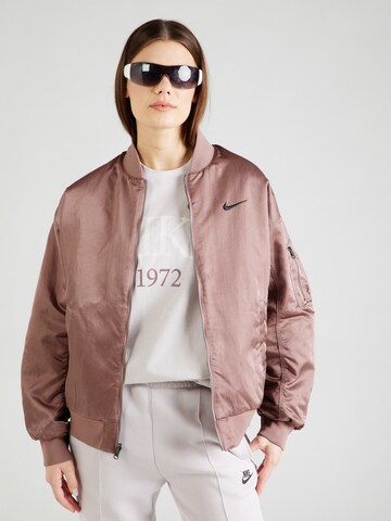 Nike Sportswear Overgangsjakke i lilla: forside