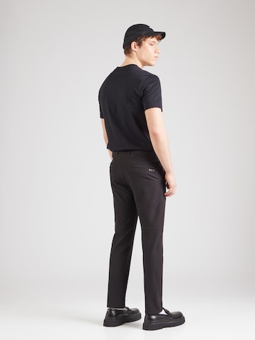 BOSS Slimfit Spodnie w kant 'Commuter' w kolorze czarny