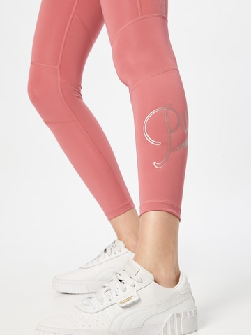 PUMA Skinny Sports trousers in Pink