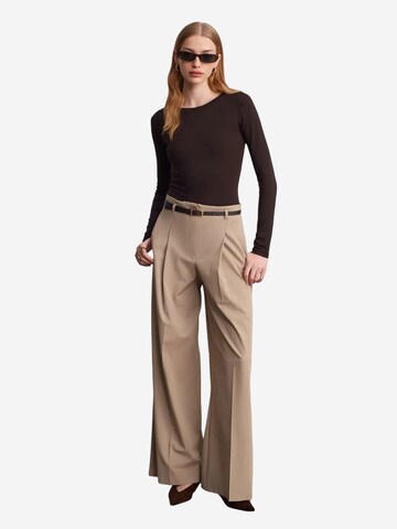 Wide leg Pantaloni di Dilvin in beige