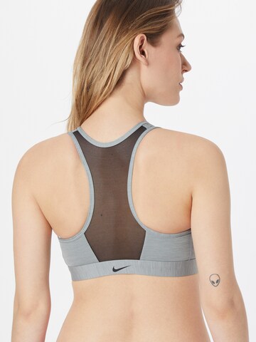 Bustier Soutien-gorge de sport NIKE en gris