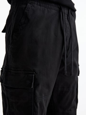 Loosefit Pantaloni cargo di Pull&Bear in nero