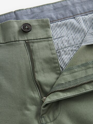 Slimfit Pantaloni chino di Next in verde