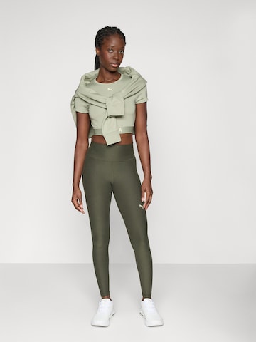 žalia PUMA Siauras Sportinės kelnės 'CLOUDSPUN'