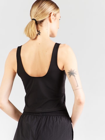 PUMA Sporttop in Schwarz