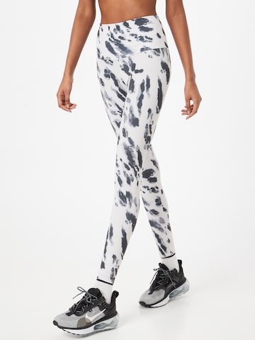 Skinny Pantalon de sport Onzie en blanc : devant