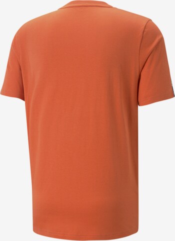 Maglietta di PUMA in arancione