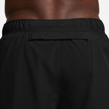 NIKE Loose fit Workout Pants 'Challenger Swoosh' in Black