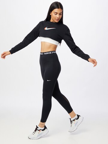 NIKE Skinny Spodnie sportowe w kolorze czarny