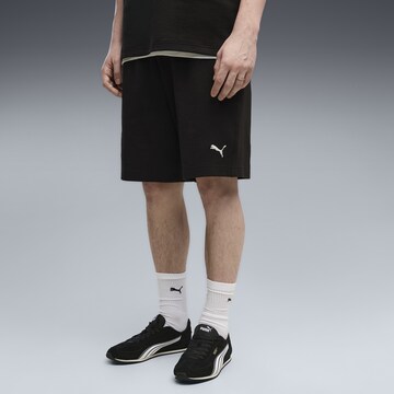Loosefit Pantalon de sport 'Essentials Elevated' PUMA en noir : devant