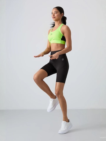 Haut de sport Tommy Life en vert