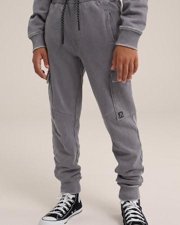 Tapered Pantaloni di WE Fashion in grigio