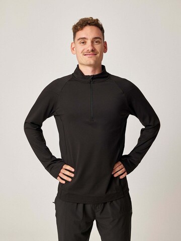 SNOCKS Sportsweatshirt in Zwart: voorkant