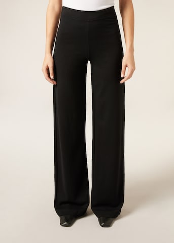 CALZEDONIA Flared Pants in Black: front