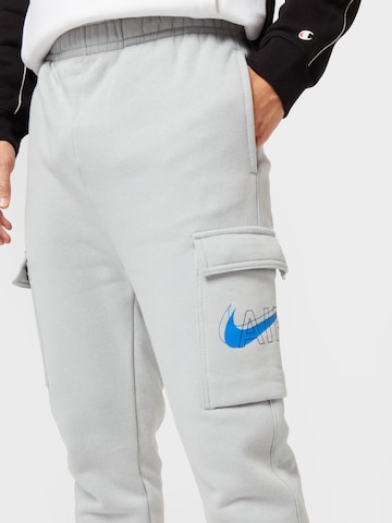Nike Sportswear Zwężany krój Bojówki w kolorze szary