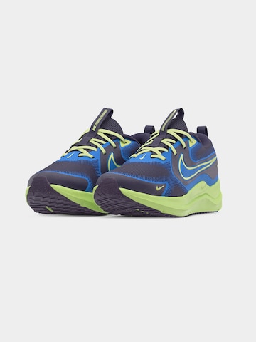 Chaussure de sport 'COSMIC' NIKE en gris