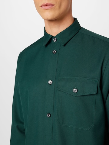 minimum جينز مضبوط قميص 'KANJE' بلون أخضر