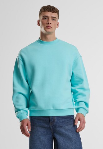 Sweat-shirt Urban Classics en bleu : devant