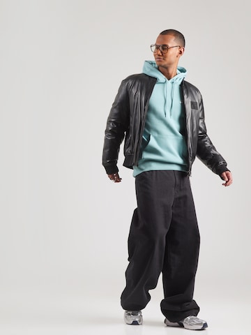 Nike Sportswear Bluzka sportowa 'CLUB' w kolorze zielony