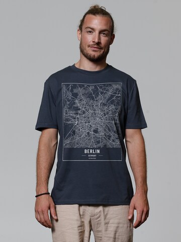 T-Shirt 'City' Watapparel en bleu : devant