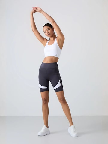 Haut de sport 'Aktive Oberteile' Tommy Life en mélange de couleurs