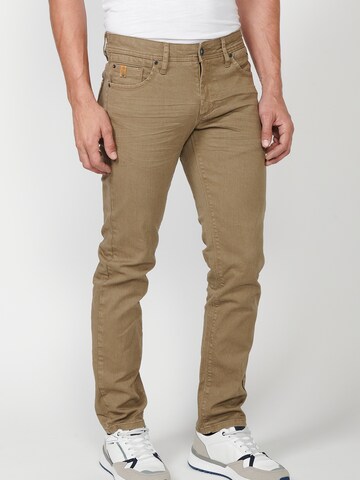 Coupe slim Jean KOROSHI en marron