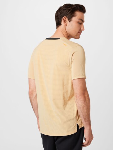 NIKE Funktionsskjorte 'Rise' i beige