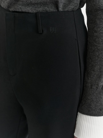 TATUUM - Loosefit Pantalón 'Sereneke' en negro