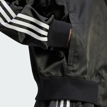 ADIDAS ORIGINALS - Chaqueta de entretiempo en negro