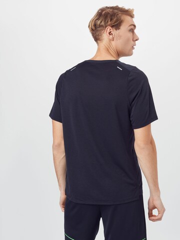 NIKE Functioneel shirt 'Breathe Rise' in Blauw