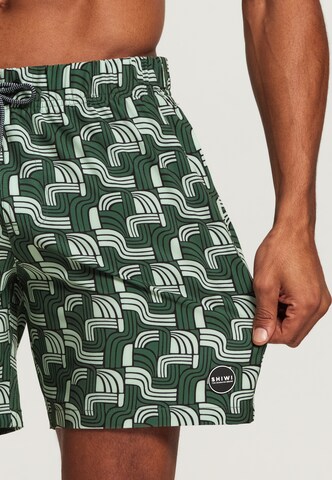Shiwi Kratke kopalne hlače 'pacific surf 4-way stretch' | zelena barva